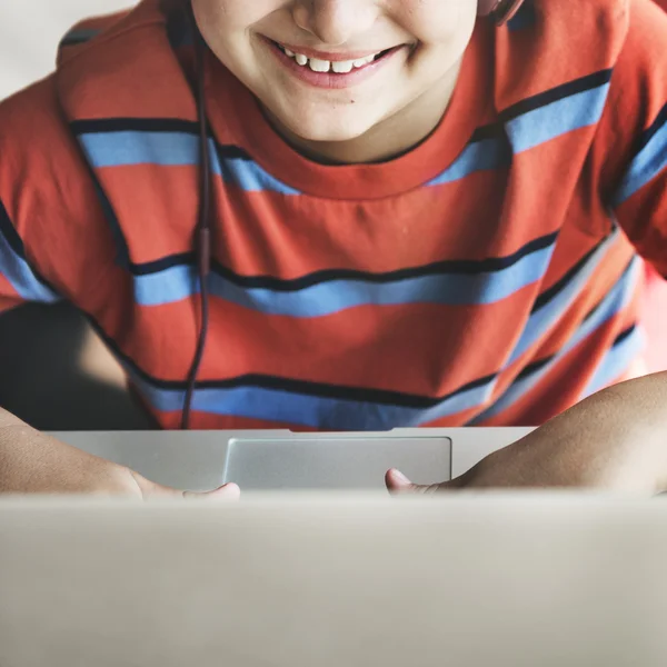 Smiling Boy with laptop — Stock Photo, Image