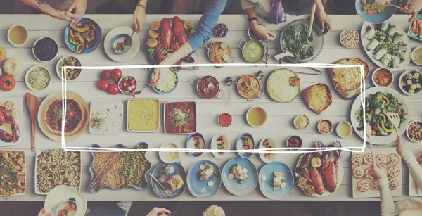 Mesa con comida y marco —  Fotos de Stock