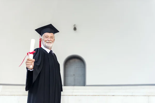 senior man in academic dress