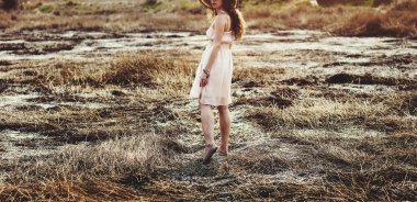 Summer girl walking on Grassland clipart