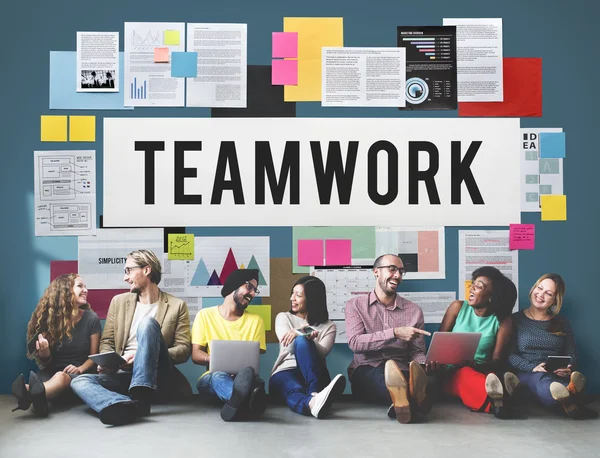 Diversity friends near wall with teamwork — Stock Photo, Image