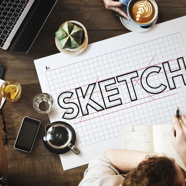 Table with poster with sketch — Stock Photo, Image
