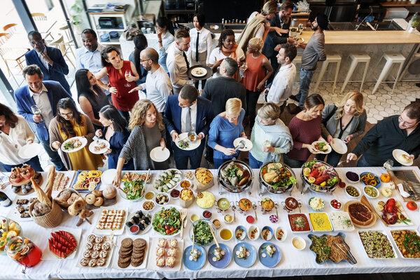 diversity people eating reception food