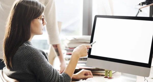 Woman showing on monitor — Stock Photo, Image