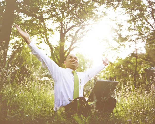 Happy businessman outdoors — Stock Photo, Image