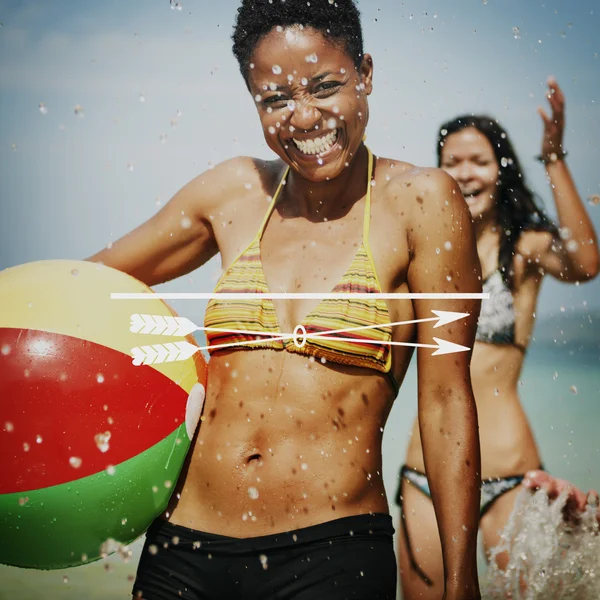 Happy women with beach ball — Stock Photo, Image