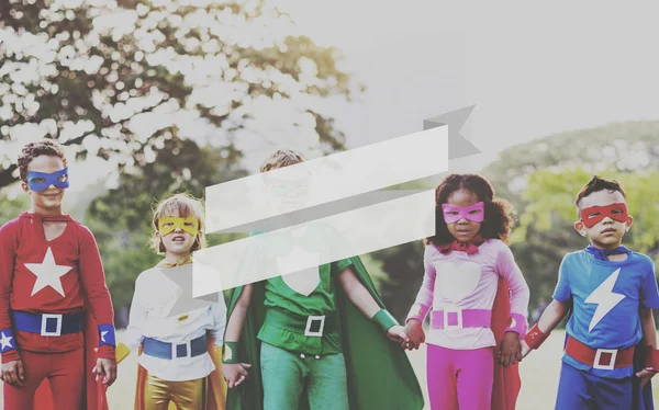 Kids in Superhero costumes — Stock Photo, Image