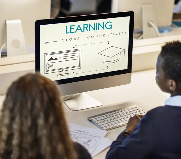 Classmate pupils using computer — Stock Photo, Image