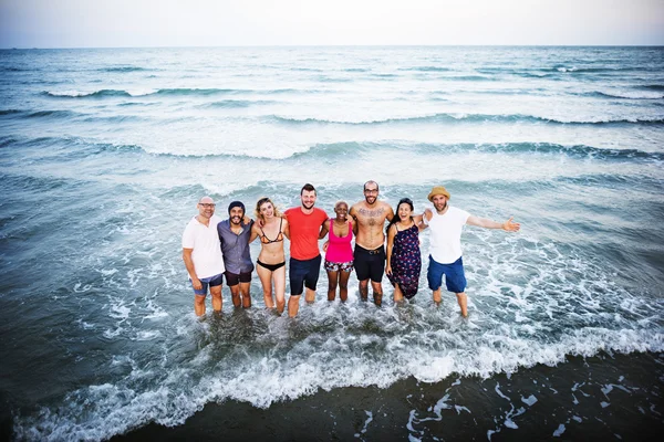 Friends on summer beach — Stock Photo, Image