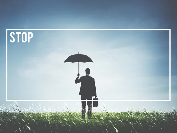 Business man in suit holding umbrella — Stock Photo, Image