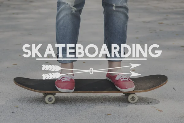 Woman on skateboard on background — Stock Photo, Image