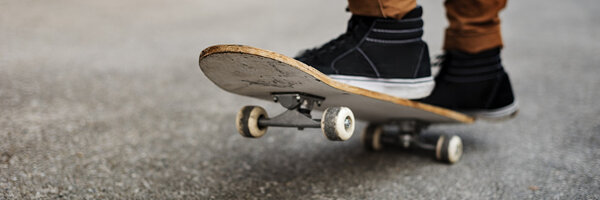 young man riding skateboard