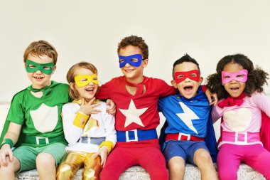 Kids in Superhero costumes clipart
