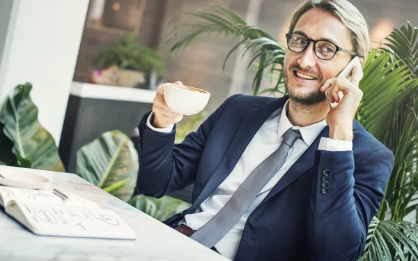 Bel homme d'affaires avec café — Photo