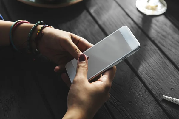 Woman holding digital device — Stock Photo, Image