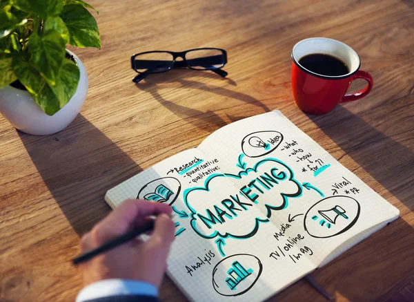 Businessman writing in notebook — Stock Photo, Image