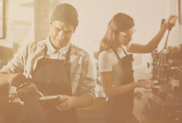 Professional baristas brewing coffee — Stock Photo, Image