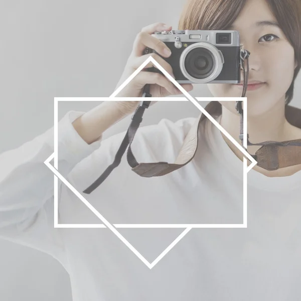 Brunette Girl and photo camera — Stock Photo, Image
