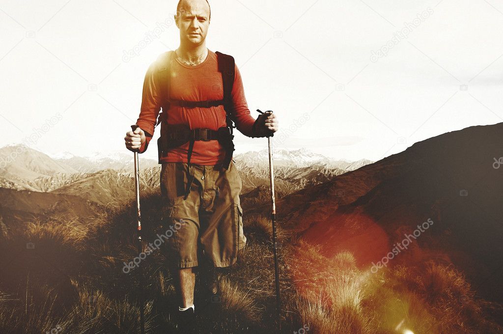 man hiking in mountains  