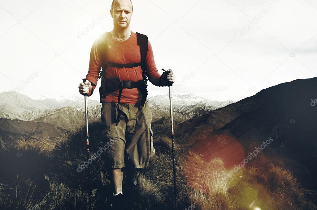 man hiking in mountains  