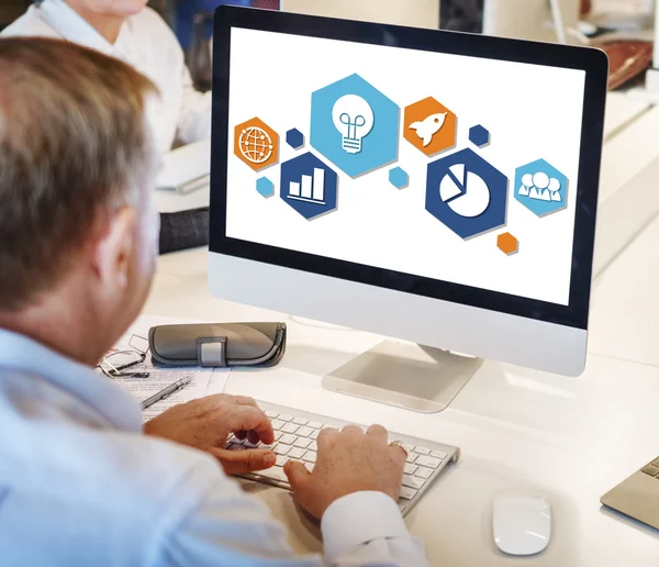 Mature businessman working on computer — Stock Photo, Image