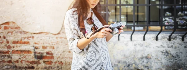 Beautiful woman with camera — Stock Photo, Image