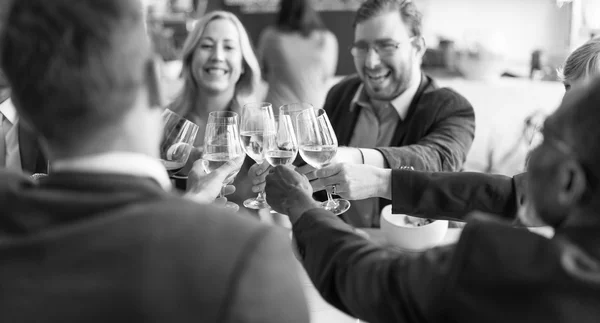 Business People Cheers with Wine At the restaurant — Stock Photo, Image