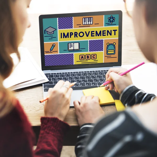 Girls studying with laptop — Stock Photo, Image