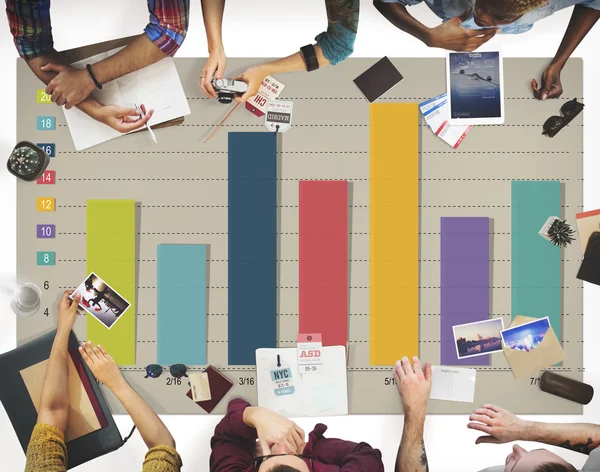 Group of people sitting at table — Stock Photo, Image