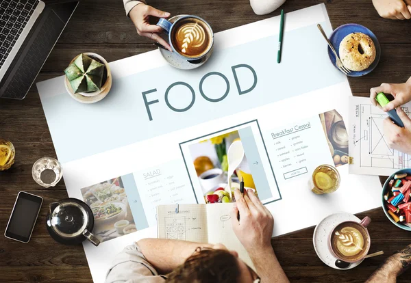 Mesa com cartaz com conceito de comida — Fotografia de Stock