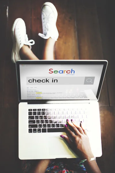 Woman searching text Check In — Stock Photo, Image