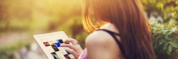 Girl browsing in Tablet — Stock Photo, Image