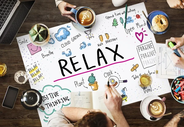 Mesa com cartaz com conceito de relax — Fotografia de Stock