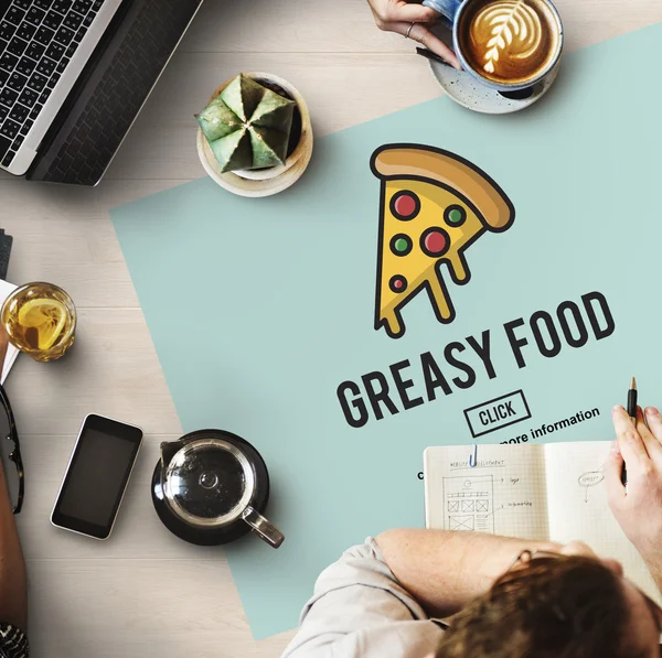 Table with poster with Greasy Food concept — Stock Photo, Image