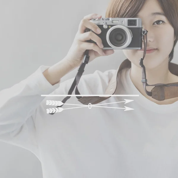 Asian girl with camera — Stock Photo, Image