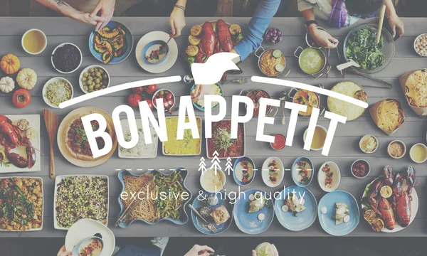 Table with food and Bon Appetit Concept — Stock Photo, Image