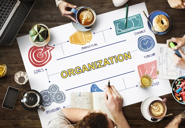 Table with poster with Organization concept — Stock Photo, Image