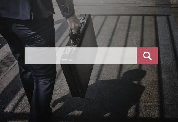 Businessman holding briefcase — Stock Photo, Image