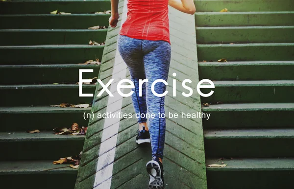 Sportive woman running upstairs — Stock Photo, Image