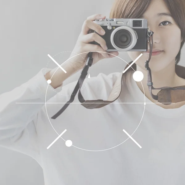 Asian girl with camera — Stock Photo, Image