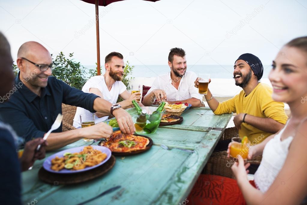 Happy Friends hanging out Together and eating Pizza · Free Stock Photo