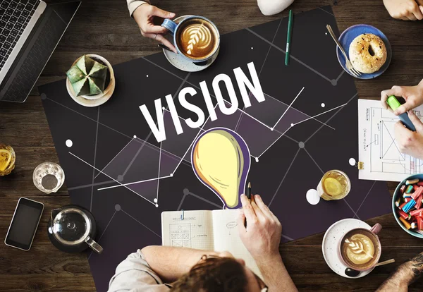 Table avec poster avec concept de vision — Photo