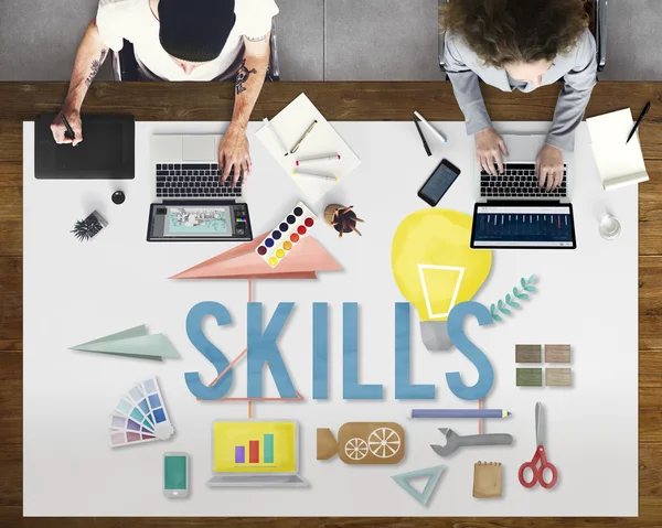 People working with laptops at table — Stock Photo, Image