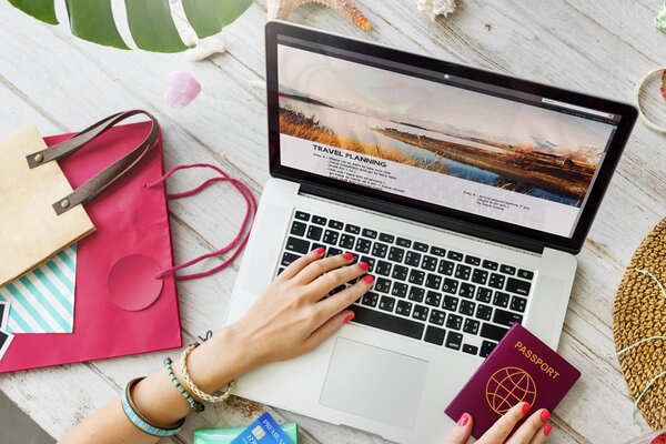 woman typing on laptop keyboard
