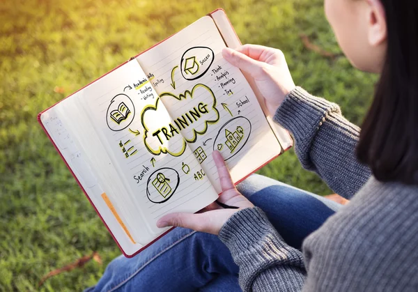 Girl holding diary with notes — Stock Photo, Image