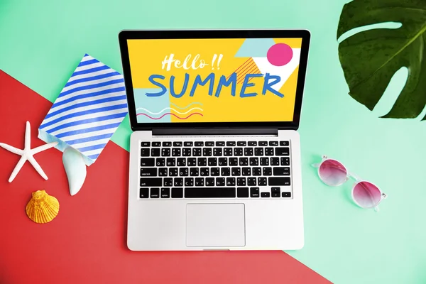 Laptop and summer collection — Stock Photo, Image