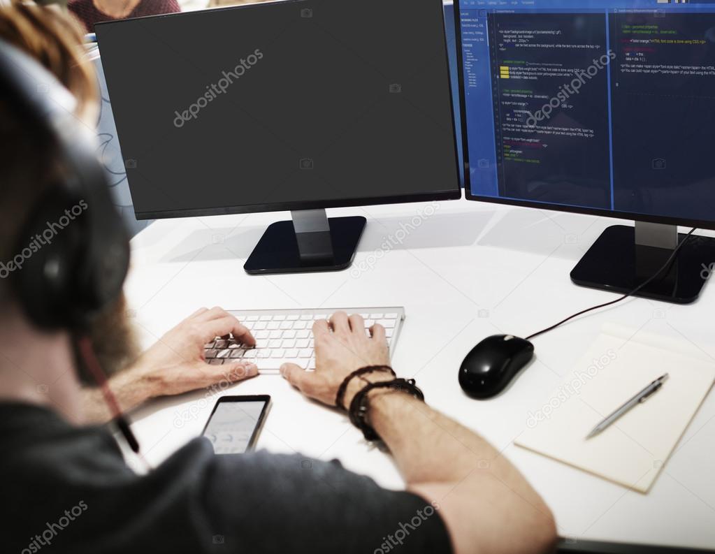 businessman working on computer with coding