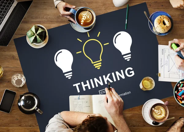 Table with poster with thinking concept — Stock Photo, Image