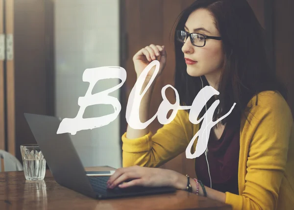 Woman with laptop and phone — Stock Photo, Image