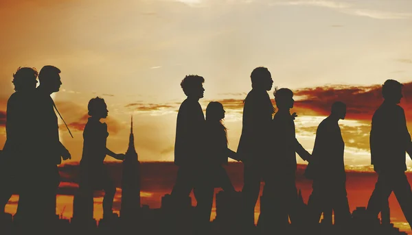 Business People silhouettes on sunset — Stockfoto